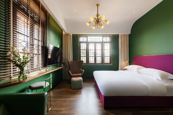 Interior of Harmony Courtyard Double Room with Mountain View, showcasing Gulangyu Accommodations' rustic charm and comfort