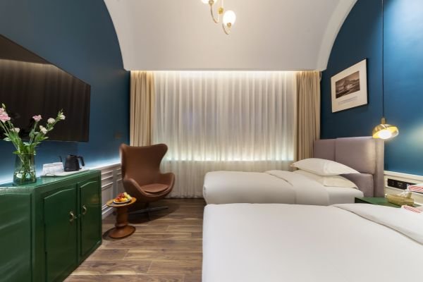 Interior of Harmony Courtyard Small Twin Room, showcasing Gulangyu Accommodations' cozy design for solo travelers